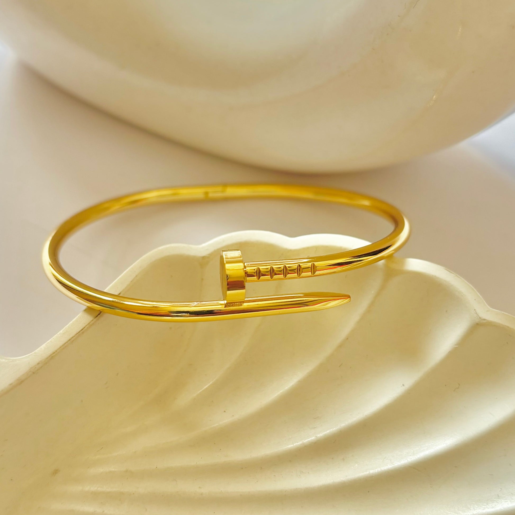 Gold plated nail bracelet in india gleamora jewellery cartier inspired